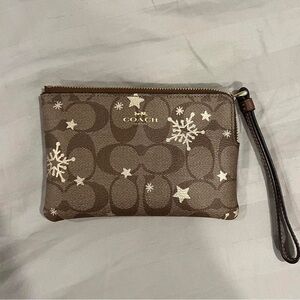COACH star and snowflake signature canvas wristlet